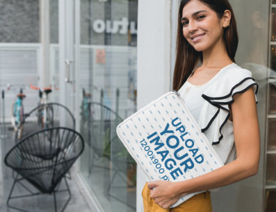 Laptop Sleeve Mockup Featuring a Woman Posing