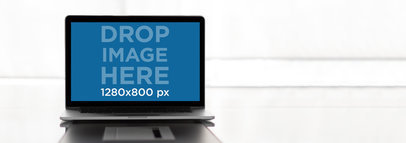MacBook Mockup Template over a Sleek Desk a9455