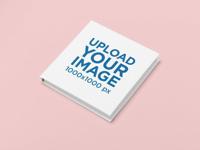 Studio Mockup of a Square Hardcover Book