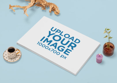 Mockup of a Hardcover Book Surrounded by Decorations