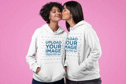 Pullover Hoodie Mockup Featuring a Woman Kissing Her Girlfriend 