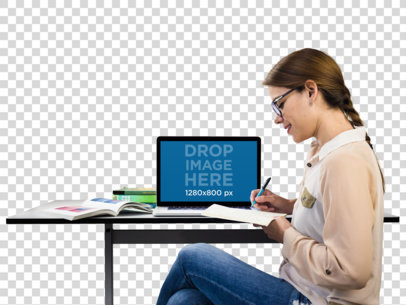 MacBook Mockup of a Young Student Taking Notes
