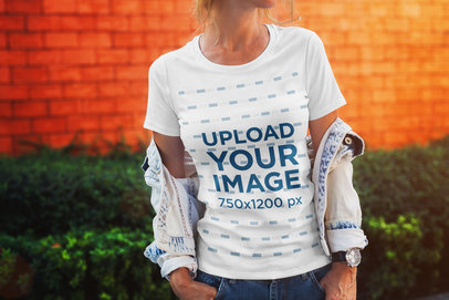 Mockup of a Woman Showing of Her T-Shirt From Under a Jacket