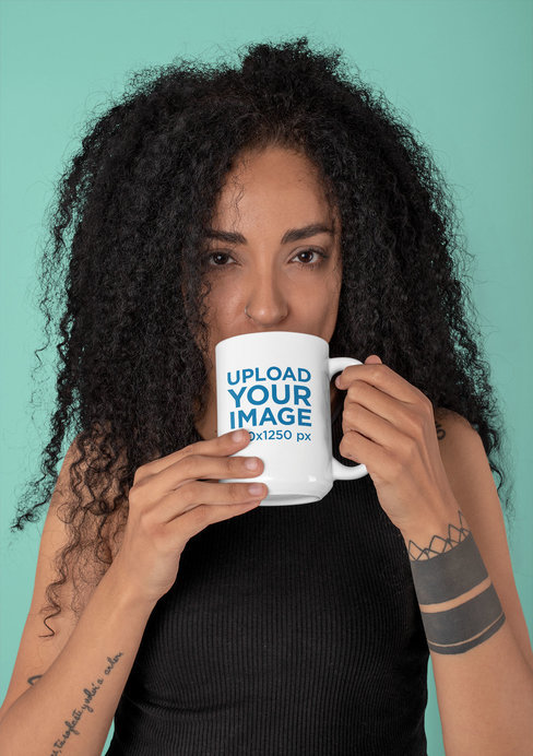 Mockup of a Tattooed Woman Drinking from a 15 oz Mug