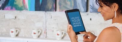 iPad Mockup Featuring a Woman at an Art Gallery a5491