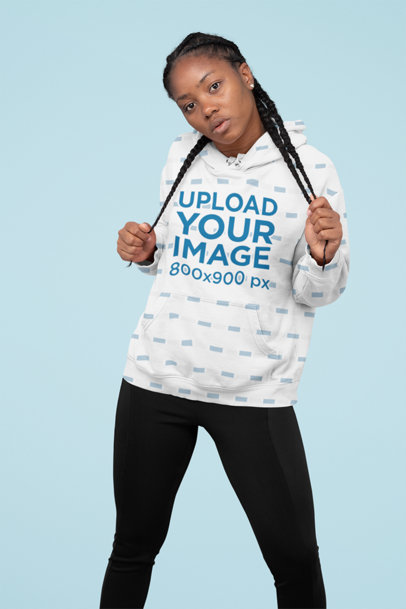 Pullover Hoodie Mockup of a Serious Woman Grabbing Her Braids 