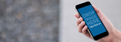 Mockup Featuring a Black iPhone 6s in Angled Position