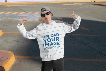 Mockup of a Man with a Crewneck Sweatshirt Posing at an Empty Parking Lot