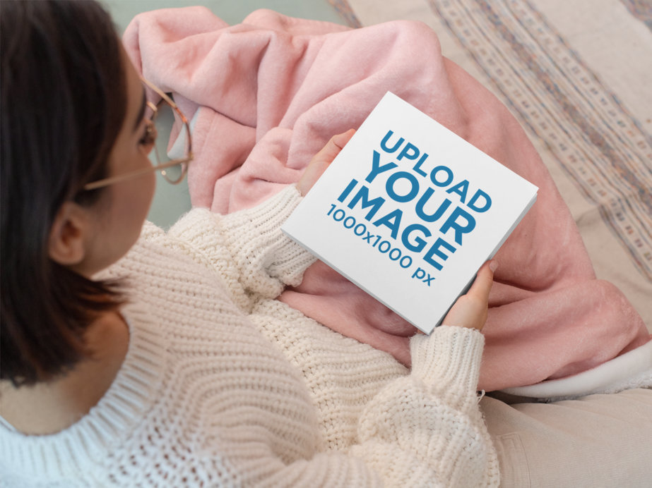 Mockup of a Short-Haired Woman Contemplating a Squared Book