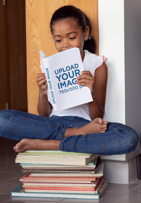Book Mockup of a Girl Sitting on a Pile of Books 