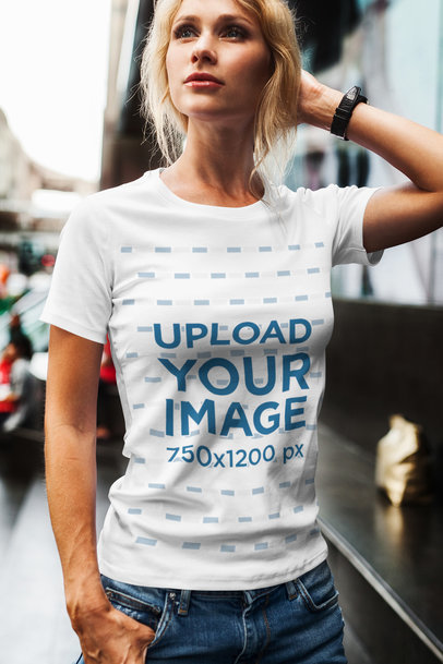  Mockup of a Woman Posing with a T-Shirt in the City