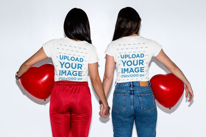 Back View Mockup of an LGBT Couple Wearing T-Shirts and Holding Hands