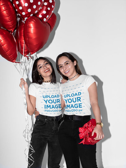 T-Shirt Mockup Featuring an LGBT Couple Holding Red Balloons and a Gift 