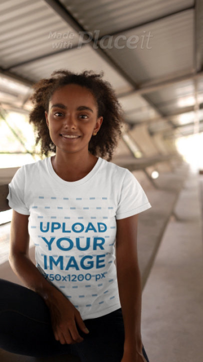 Crewneck T-Shirt Video Featuring a Curly-Haired Woman Smiling