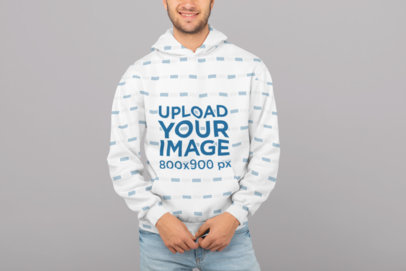 Sublimated Hoodie Mockup Featuring a Smiling Man inside a Studio
