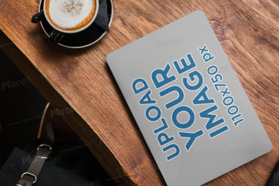 Laptop Cover Mockup Featuring a Computer Placed on a Wooden Table 