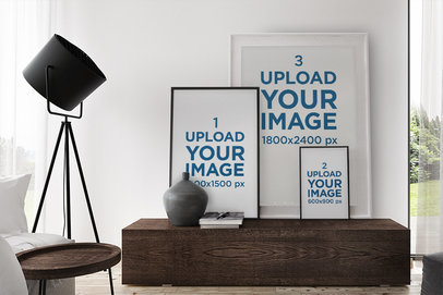Mockup of Three Art Prints of Different Sizes in a Living Room