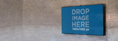 Flat Screen TV Mockup Over a Concrete Wall