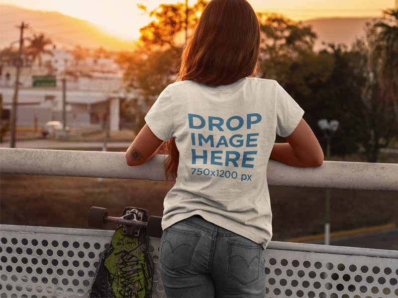 T-Shirt Mockup of a Skater Woman Watching The Sunset 
