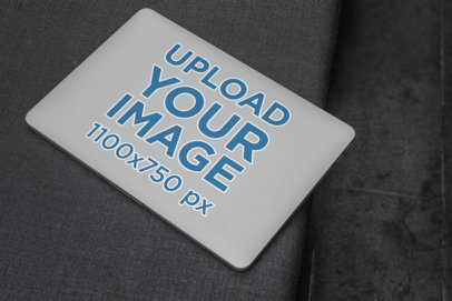 Sticker Mockup Placed on a MacBook 