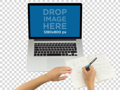 Top Shot Macbook Mockup Featuring a Woman Writing in Her Notebook