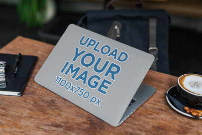 Laptop Cover Mockup Featuring a Latte on a Table
