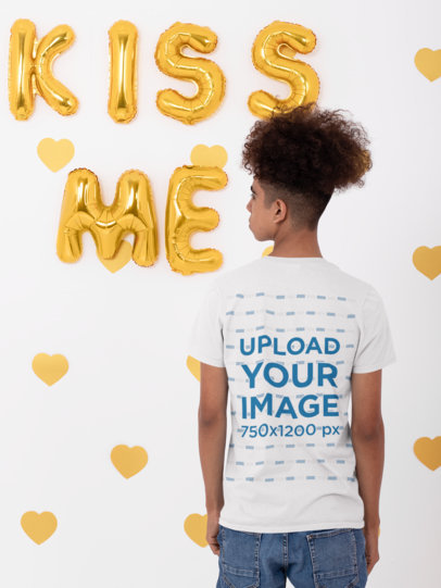 Back View T-Shirt Mockup of a Young Man Posing by Some Letter Balloons 31220
