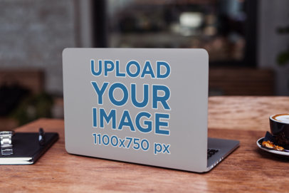Mockup of a Laptop Cover over a Table