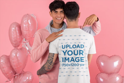 Back View T-Shirt Mockup Featuring an LGBT Couple Surrounded by Heart-Shaped Balloons 