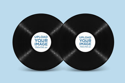 Mockup of Two Vinyl Records Against a Customizable Background