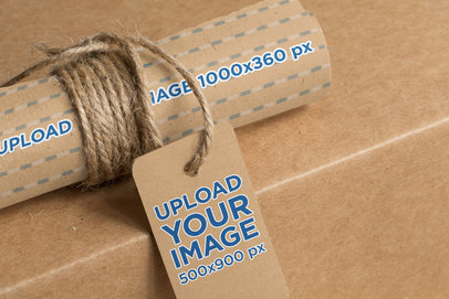 Mockup of a Cardboard Label Tag Placed on a Kraft Paper Roll 1303-el1