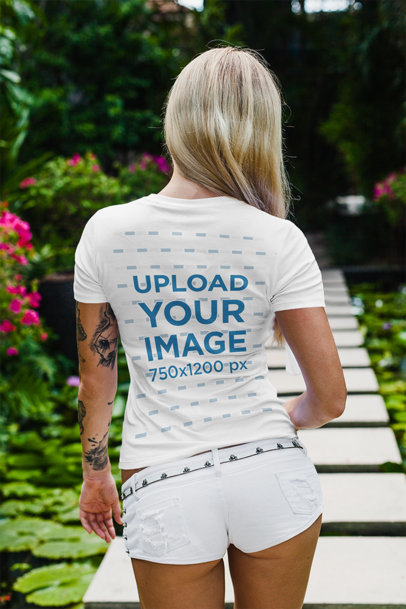 Back View Mockup of a Long-Haired Woman Wearing a T-Shirt