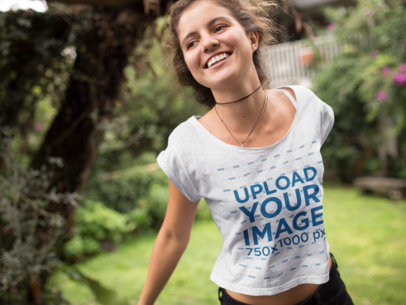 Happy Woman Jumping in Her Yard Tee Mockup