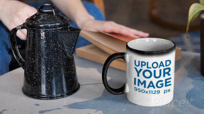 Video Featuring a Woman Pouring Coffee into an 11 oz Magic Mug Placed Next to a Book 