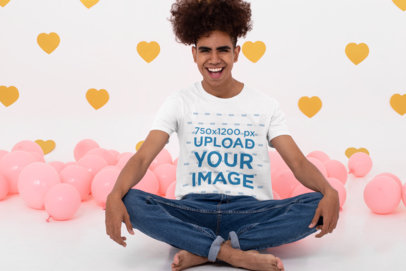 T-Shirt Mockup of a Happy Man Surrounded by Lovely Decorations 31229