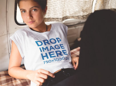 Mockup of a Pretty Woman Wearing a T-Shirt in the Back of a Van