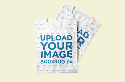 Mockup Featuring Two Sublimated Crew-Neck T-Shirts Placed on a Colored Surface 1055-el1