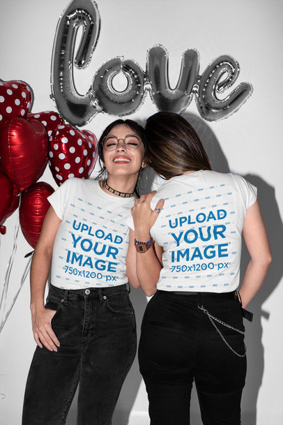 Mockup of Two Women Wearing Matching T-Shirts on Valentine's Day