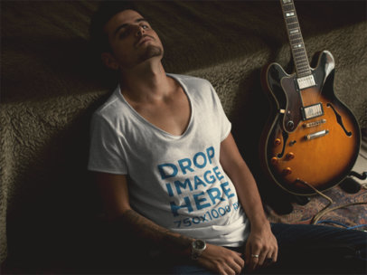 Mockup of an Alternative Guy Wearing a T-Shirt with His Guitar a111680