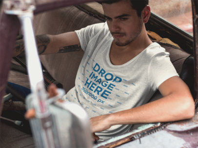 Round Neck Tee Mockup Featuring a Cool Guy in an Old Truck 11679