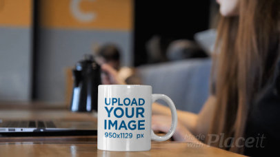 Video of a Woman Pouring a Hot Beverage into an 11 oz Coffee Mug