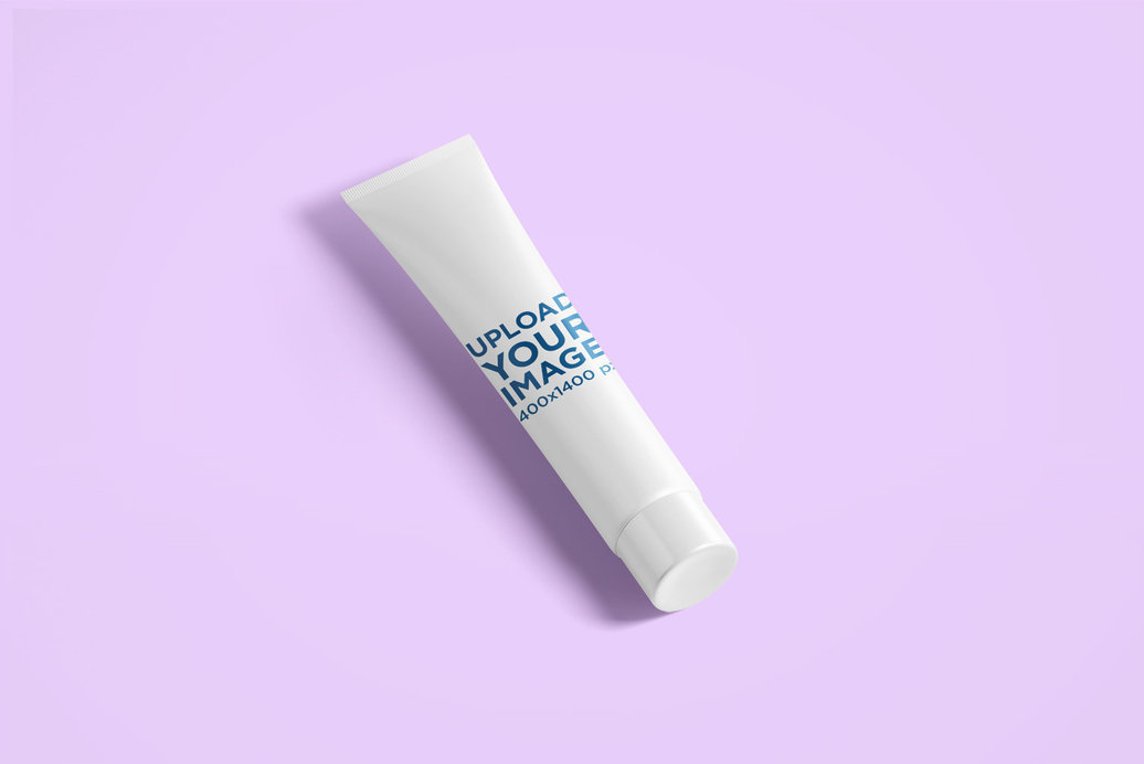 Mockup Featuring a Cosmetic Tube Placed on a Solid Color Surface 