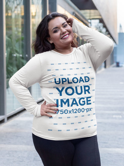 Plus Size Mockup Featuring a Confident Woman Wearing a Long-Sleeve Tee 