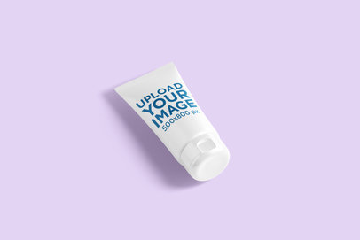 Minimal Mockup of a Cosmetic Tube Placed on a Plain Color Surface 