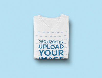 Mockup of a Folded V-Neck T-Shirt on a Flat Surface