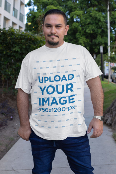 Plus Size T-Shirt Mockup Featuring a Serious Man Posing at a Sidewalk 