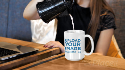 Video of a Woman Pouring a Hot Drink Into a 15 oz Mug