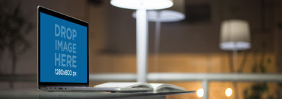 MacBook Pro Mockup on a Glass Reading Table