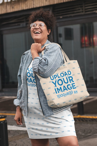 Plus Size Shift Dress Mockup Featuring a Woman Laughing and Holding a Tote Bag