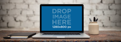 Wide Shot MacBook Pro Mockup in Front of a White Brick Wall a11766